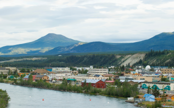 Aerial view of a Yukon town on the waterfront