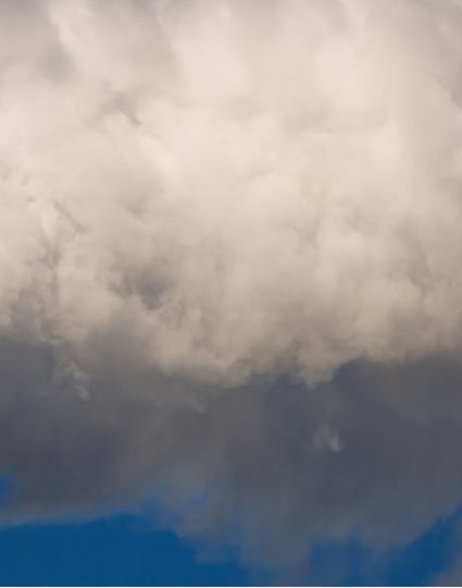 Factory exhaust pipes in sky with smoke 